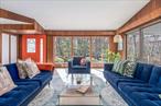 Permit #1253. Welcome to 2745 Vanston Road, a hidden gem nestled in the prestigious Nassau Point community. This mid-century modern retreat, spread over a sprawling 1.3 acres, offers a perfect blend of privacy and comfort. The open-concept living space is bathed in natural light with an EIK, and an open air, wraparound deck off the living room, creating an inviting atmosphere for both relaxation and entertainment. This home features three spacious bedrooms and two bathrooms, providing ample space for everyone. An additional half-bath ensures convenience for all. The large master bedroom is complete with its own bathroom. The heart of the home is undoubtedly the large family room, offering a welcoming space and convenient access to the backyard for additional entertainment. Enjoy all the amenitities the North Fork has to offer including access to the coveted Nassau Point beach just steps from your door. Rented - June - August.Available - September ($6500), Weekly ($2000 w/ 2 week minimum), Annually ($4000/ month)