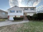Quiet And Convenient Mid-Block Location, This updated Split Level with added third floor Rental property Has 4/5 Bed Rooms, 2.5 Baths and Hardwood Floors Throughout. freshly painted interior and newly polished hard wood floors. The spacious living room And Central A/C. Full finished basement. Short walk to LIRR station. Award-Winning Syosset School District.Described Info Is Deemed Accurate But Not Guaranteed.
