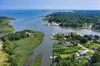 Welcome to 13 Bayberry Ln, a beautiful bay front home offering 2, 000 square feet of elegance and comfort. Perfectly positioned with easy access to Shinnecock Bay, itâ€™s a dream spot for boating enthusiasts, featuring private water access with a dock. The open-concept living space is bright and welcoming, designed for both leisure and entertaining. The home includes three generously sized bedrooms, with a primary suite featuring a private en-suite bathroom. The sleek, modern kitchen is equipped with top-of-the-line appliances and ample storage, while the dining area offers a perfect setting for meals. Outside, the tranquil, scenic lot provides an ideal space for relaxation or hosting gatherings. This exceptional property is conveniently located near the bay and ocean beaches, top restaurants, and Main Street shopping, offering the best of the Hamptons just moments away. Schedule your viewing today!