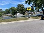 Dock with 33-67 Feet Frontage x 20 Feet Dept In Lindenhurst with Canal access. Electric & Water available. Close to Marinas and Montauk Highway.
