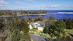 This stunning waterfront home in Hampton Bays offers an unparalleled living experience on the serene Peconic Bay. With six spacious bedrooms and six beautifully appointed bathrooms, this property has been thoughtfully renovated in 2018 to combine modern elegance with luxurious comfort. The primary suite features breathtaking water views, providing a perfect retreat where you can unwind and enjoy the natural beauty that surrounds you. IPE decking adds a touch of sophistication to the outdoor spaces, ideal for enjoying the bayâ€™s tranquil atmosphere.Entertaining is a breeze with top-of-the-line appliances in the gourmet kitchen, making it a dream for any chef. The seamless flow between the indoor and outdoor living spaces allows for effortless hosting, with an outdoor kitchen perfect for al fresco dining. A highlight of the home is the expansive entertainment room on the second floor, which includes a pool table and beverage area, offering the ideal space for relaxation and fun. Additional living areas on this floor provide even more space for family and guests to enjoy.The homeâ€™s design is complemented by luxurious marble bathrooms that offer a spa-like ambiance, enhancing the feeling of opulence throughout. Situated at the end of a peaceful cul-de-sac, this property provides ultimate privacy and quietude while being close to all the amenities Hampton Bays has to offer. Whether you&rsquo;re seeking a summer escape or a year-round residence, this waterfront home combines the best of comfort, style, and functionality.