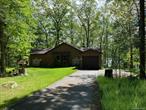Come and see this unique home with approximately 200â€™ of lakefront with a dock and raft on pristine Lochada Lake! Experience the tranquility of the Glen Spey area â€”where country living becomes extraordinary! This picturesque area is quickly becoming one of the most sought-after destinations with farmer markets close by makes this the gem youâ€™ve been waiting for. Nestled on 3.6 acres, with steps leading directly to the waterâ€™s edge, the possibilities are endless. Dive into adventure with swimming, boating, and fantastic fishing, or simply unwind by the lakeside dock and raft â€”whether soaking up the sun, reading a great book, or watching eagles soar overhead. As the day winds down, enjoy a glass of wine on the deck, taking in the starry reflections on the peaceful lake. The home itself is a masterpiece, with an open-concept main level featuring cathedral ceilings and seasonal lake views. A seamless flow connects the spacious living, dining, and kitchen areas, perfect for gatherings. Imagine cooking in your beautiful kitchen with an island, sourcing fresh ingredients from the nearby farmers&rsquo; market. Enjoy breakfast in the nook while watching turkeys forage for acorns in the morning light. The cozy formal dining area and living room, complete with a wood-burning fireplace, lead out to the large deck, ideal for entertaining or simply relaxing. The master bedroom on the main level boasts a cedar-lined closet and access to a screened-in porch, offering a private retreat. The luxurious master bath features a Jacuzzi tub, remote-controlled window shade, and a heat fan. Another spacious bedroom with a cedar-lined closet also enjoys a screened-in porch and is steps away from a full bathroom. A convenient interior entry to the garage rounds out the main level. Downstairs, the lower level is designed for entertaining, with heated floors and an open space that includes a dry bar and a charming propane potbelly stove. It also offers a bedroom, a large office, and a full bath with a heat fan. Whether itâ€™s winter or summer, the homeâ€™s mini-split units ensure comfort, providing both cooling and heating. Plus, enjoy peace of mind with a self-starting, propane-fueled generator for power outages. An 8x8 storage shed and a paved driveway complete the property. Located just 15 minutes from the Port Jervis train station, youâ€™ll be close to exciting attractions like the Delaware River for white-water rafting, Circle Park in Glen Spey, Bethel Woods for concerts, Resorts World Catskills Casino, and much more. This is your chance to own a truly one-of-a-kind lakefront home in an area that has it all!