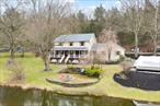 Stunning Colonial Home Nestled on A Little Over 20 Acres with a Serene Private Pond and Park-like Surroundings! Relax on the Inviting Covered Front Porch, Perfect for Enjoying Summer Days and Evenings! The Generous Kitchen Provides Ample Cabinet Space & Stainless Steel Appliances! Adjacent to the Kitchen is Your Eat-In Area with Bay Window, along with a Formal Dining Room, Living Room, and a Sitting Room Featuring a Free Standing Wood-Burning Stove! This Main Level Showcases Beautiful Hickory, Oak, and Bamboo Wood Flooring Throughout! The First Floor Also Includes a Laundry Room, a Main Bathroom, and Convenient Garage Access! Upstairs, You&rsquo;ll Find 3 Bedrooms, Including an Office/Bedroom and a Walk-Up Unfinished Attic! The Finished Basement Offers a Storage, Utilities, and Plenty of Room for Your Creative Ideas! This Property Provides Ample Parking for Up to 10 Vehicles, Plus a Fenced Garden with Raised Herb and Vegetable Beds, Along with Apple, Pear, and Peach Trees! Two Sheds Offer Plenty of Outdoor Storage, and the Heated 2-Car Garage Adds Extra Convenience! With a New Roof Installed in 2023, 6+ Zone Heating, New High-Velocity Central Air, a Well-McLain Indirect Furnace, and a Hot Water Heater, This Home is Ready for You! Donâ€™t Miss Your Chance to Experience This Private Oasis Today! 1Hr to NYC and Just Minutes to Hours Away From Many Hudson Valley Tourism Hot Spots, From Orchards, Shopping, And Legoland Just To Name a Few!