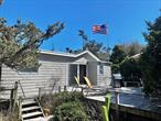 Charming Beach House on the West End of the Grove on a quiet, lovely walk! 4 bedrooms, open living dinning with wood burning stove. Bright, sunny, private deck...located just 4 houses off the beach!!