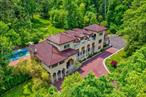 This stunning custom-built Mediterranean estate, rebuilt in 2006, offers a luxurious retreat designed for relaxation and elegant entertaining. Situated on 2.2 private acres within the prestigious Harbor Acres community, this residence ensures the utmost privacy and exclusivity, with a gated entry and a long, private driveway. Adding to its allure, a Right of Way grants direct beach access.The beautifully landscaped grounds boast lush gardens and a perfectly sized pool, offering a serene outdoor oasis. As part of the Village of Sands Point, residents enjoy the benefits of private police services, access to the Harbor Acres Beach Club and tennis courts, and proximity to the Sands Point Village Club, which features golf, a pool, a beach, and both casual and fine dining.An extraordinary offeringâ€”a must-see with endless potential!