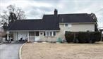 Rare one-family cape in Levittown with a large 8349sf lot! Spacious, park-like backyard with a pergola and large deck. Granite countertops in an updated eat-in kitchen with a large island. Open floor plan with a Dining Area, and Wood-Burning cultured stone-faced Fireplace, that flows out to the large backyard and deck - perfect for hosting large gatherings. Master Bedroom on the first floor, with a Full Bathroom, Second Bedroom, and finished bonus room for possible Family Room, Den or Home Office. Upper floor has 2 additional Bedrooms with their own Half Bathroom, and washer/dryer. Large storage space in garage. Near to buses, LIRR, parks, restaurants & shopping. Appliances all included as is. Property is being sold entirely as is in its present condition, including all structures and improvements as they stand. Though believed accurate, all information including taxes, schools and certificate of occupancy must be independently verified. Taxes are stated for 2024-2025. Schools are as reported by Niche. Owner, Listing Agent & Broker are not responsible for any inaccuracies, prospective buyers & their agents must confirm all facts.