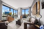 Welcome to 550 Vanderbilt, a luxury corner condo unit in the heart of Prospect Heights in Pacific Park! This spacious residence, newly built in 2016, features an abundance of natural sunlight, thanks to walls of windows on the Eastern and Southern elevations. With two bedrooms and two bathrooms, the unit offers soaring 10 foot ceilings with a comfortable and bright living space. The kitchen features designer cabinetry, the best European appliances and is complete with a breakfast bar. In-unit laundry is there for your convenience. The large windows create an airy atmosphere, with an overall view of several Brooklyn tree lined neighborhoods.Building amenities are designed with comfort and convenience in mind. Residents enjoy access to a bike room, parking availability, and an elevator for easy access to the unit. The common outdoor rooftop space provides a perfect setting to relax and enjoy the view. The gym ensures a fitness routine is never far away, while the full-time doorman, concierge service, and 24-hour security provide peace of mind. Additional amenities include storage, on-site laundry, a curated library, and a lounge with a catering kitchenâ€”ideal for hosting events or relaxing with friends. For pet owners, there is even a pet grooming station on-site.Located in the vibrant Prospect Heights neighborhood, this unit is just minutes away from several subway lines, making commuting effortless. The area boasts an eclectic mix of dining options, lively bars, and supermarkets for all your daily needs. Culture enthusiasts will appreciate being near iconic attractions such as Prospect Park, the Brooklyn Botanic Garden, and the Barclays Center.