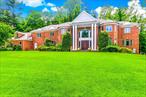 Stunning Custom Built Brick Beauty. Located in the heart of Scarsdale and within Edgemont and Ardsley School Districts for your school choices. This beauty boost over 5700 sq ft of living space that is not including the 2700 sq ft. finished basement. With it&rsquo;s 5 glorious bedrooms and 5 1/2 immaculate bathrooms. This house was designed and decorated by the current owner. Every room from the custom designed kitchen with center island which is a chefs delight to the meditation room had heart put into it. Each of the bedrooms have a private bathroom as well as intercoms to the whole house. All the Bedrooms are on the second floor with a quiet sit out area at the top of your grand stairs. Which is also down from the game room and spare room above the three car garage. Your Master bedroom suite is spacious bright and breath taken enjoy quiet time in your secluded Master Bath. Easy sneak away from the second floor to the full finished walkout 2700 sq ft basement. Walk out to your meticulously maintained acre of property. This home is in a cul-de-sac for privacy. Additional Information: ParkingFeatures:3 Car Attached,
