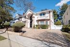 Beautifully renovated splanch in SD 15 Woodmere Tree Streets with new boiler, new roof, new pavers, huge kitchen, low taxes, much more.