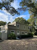Quiet cul-de-sac in the Village of Quogue with Quogue Beach use. TENNIS LOVERS Har Tru Court. Heated pool, enclosed out door shower. Open floor plan of Livingroom, Dining room, Kitchen. First floor has 2 en suite bedrooms, plus 2 bedrooms and double sink full bath, laundry and guest half bath. Second floor is very large en suite primary bedroom with private sun deck. Entire house inside and out is newly renovated fresh and clean. Hardwood floors throughout. Available for SHORT TERM: June 30th - July14th (15 days) $25, 000. ALSO August 15th - September 2nd (18 days) $35, 000
