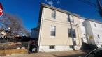 Nestled in the heart of College Point, this legal 2-family corner property offers both convenience and income-generating potential. Featuring a 2-bedroom unit over another 2-bedroom unit, each unit has been thoughtfully updated, including modernized gas and electric systems for enhanced efficiency and reliability. This well-maintained home is currently tenant-occupied, making it an excellent choice for investors seeking steady rental income or homeowners looking for additional financial flexibility. Located just steps from the Q25 and Q65 bus stops, this property offers seamless access to public transportation and is minutes from major highways, ensuring an easy commute. Enjoy the convenience of having top-rated restaurants, supermarkets, and popular shopping destinations such as BJâ€™s, Target, Staples, and Starbucks just around the corner.