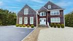This stunning post modern home was built in 2014, sits on .55 acres and offers 4, 100 sq. ft. of prestigious living space, plus an additional 1, 300 sq. ft. finished basement - for a total of 5, 400 sq. ft. First floor includes an open chef&rsquo;s kitchen, dining area, LR w/gas fireplace, 1/2 bath, large office and a heated 4 car garage. Second floor features 4 en-suite bedrooms each with its own luxurious bathroom, laundry room & an additional office/media room. The well-appointed basement features a gym, rec area, media room, and billiard room. The entire interior of the home showcases master craftsmanship and attention to detail. The backyard is perfect for entertaining and offers a spacious covered porch, heated inground pool & basketball/pickleball court. Quogue Village Beach, Quogue Schools & very low taxes make this a can&rsquo;t miss opportunity.