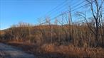 Location and visibility!! This is one of the last available undeveloped parcels next to the I-84 Exit Ramp at Route 52 in Fishkill. High visibility and super convenient from the Interstate, this 2.7 acre lot with unobstructed views of the Hudson Highlands shares its southeast boundary with the MTA right-of-way, currently in the pre-design phase of being converted to the Beacon-Hopewell rail trail. This zoned 311, dividable residential vacant land, is in a commercial corridor that the town has already been willing to rezone for highest and best use. With local road traffic on Fishkill Avenue, interstate long-haul traffic on I-84 and back door access to future regional hiking and biking traffic on the network that connects to all the trails in the Hudson Highlands, including the Appalachian Trail, this is one of the most strategically located pieces of raw land available along this entire corridor.