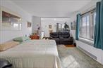 Welcome to this bright and open studio apartment in the heart of Jackson Heights, offering a fantastic opportunity for comfortable city living. This spacious unit boasts large windows that fill the space with natural light, creating a warm and inviting atmosphere. The open layout provides endless possibilities for customizing the space to suit your needs.The building offers a range of convenient amenities, including a fully equipped gym to stay active and fit, a laundromat for your convenience, and a live-in super to ensure that all your needs are promptly addressed. Additional features include an elevator for easy access and a parking garage with a waitlist, perfect for those with a car.Located in the vibrant and diverse neighborhood of Jackson Heights, this home is just steps away from an array of dining options, cafes, shops, and grocery stores. Enjoy easy access to public transportation, with the 7 train and multiple bus routes nearby, making your commute a breeze. The area is also known for its beautiful parks and community events, offering a welcoming atmosphere for all.Don&rsquo;t miss the opportunity to make this charming studio your new home!