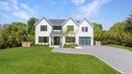 Exquisite New Construction Bordering a 35-Acre ReserveThis stunning, newly built home offers the perfect blend of modern luxury and serene privacy. Nestled beside a 35-acre reserve, it provides a peaceful retreat while remaining close to beaches and the village.Designed to maximize natural light, this showcase residence features an open-concept living area with a central fireplace, seamlessly flowing into a designer kitchen equipped with top-tier appliances, quartz countertops, and sleek modern finishes. A striking floating stairwell adds architectural elegance, while thoughtful detailsâ€”such as a custom dog showerâ€”elevate the home&rsquo;s functionality.The expansive second-floor primary suite is a private sanctuary, complemented by three additional ensuite bedrooms. A first-floor junior primary guest suite offers comfort and convenience. The fully finished lower level is designed for entertainment and wellness, featuring an open media/lounge area, a gym with a sauna, and two bedrooms with two full baths.Outside, extensive Turkish marble patios surround a luxurious inground gunite pool, creating an idyllic setting for relaxation and outdoor gatherings. This exceptional property delivers the finest in modern living, all within a tranquil yet convenient location.