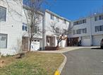 This Townhouse Style Home Features 3 Bedrooms, 2 Full Baths, 2 1/2 Baths, Formal Dining Room, & 1 Car Garage.