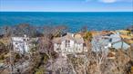 Serene, private, and tranquil oasis perfect for those looking to relax, unwind and unplug. A beautifully landscaped property overlooking the Long Island Sound with private beach access and breathtaking views from all levels of the home. Ground Level has 4 B/R&rsquo;s, 2 Baths, Laundry Room and Family Room which opens to Deck, Pool, and Bluff. Enjoy majestic sunsets from an additional deck perched at the edge of the bluff. Second Level features cathedral ceilings in Living Room, Dining Room, Kitchen, and Primary Bedroom with ensuite bath as well as guest bathroom; L/R opens to a second deck at this level. There is a two Car Garage and an outdoor shower near pool area. The house has just been redecorated and all furniture is new. The community has tennis, pickle ball and basketball courts and is adjacent to a Public Golf Course. The perfect summer escape just minutes away from all the North Fork has to offer - award winning vineyards, wineries, destination restaurants, farmstands, lavender fields, boating and great shopping! Rental Permit #1177.