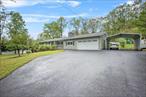 Welcome to 7 Hujay Terrace in Wappinger Falls â€“ a home that perfectly blends modern upgrades with functional amenities, offering a luxurious lifestyle and an ideal in-law suite.Step inside to find an updated kitchen featuring granite countertops, new cabinets, a new undermount kitchen sink, and new double wall ovens. The home&rsquo;s exterior is equally impressive, showcasing a new roof, new siding, and new gutters that ensure long-term durability and curb appeal.Enjoy energy efficiency and tranquility with new triple-pane windows. The property includes a new well pump and pressure tank, while the septic fields were replaced with a new tank 10 years ago.For added peace of mind, the home is equipped with a comprehensive security and fire alarm system, along with an auto-start emergency gas generator.Outdoor enthusiasts will love the Roman-end in-ground salt pool featuring a gas pool heater and a new pool liner (2020), complemented by a spacious decking area. The metal roof pavilion offers shade and a perfect space for entertaining, alongside a storage shed and a changing room equipped with two refrigerators. For convenience, there&rsquo;s a porta-potty toilet and sink near the pool area, and a hot tub conveniently located by the back door of the house.The property boasts a large circular driveway that wraps around the house, providing ample parking space for multiple vehicles.Don&rsquo;t miss the chance to own this extraordinary property!**Furniture and a Ride-on Tractor will also be available for Sale, Oil Furnace & Oil Tanks replaced 10 yrs ago, Home is wired for Cable & Sat TV and includes Verizon FiOS internet** Additional Information: Amenities:Guest Quarters, Storage, HeatingFuel:Oil Above Ground, ParkingFeatures:2 Car Attached,