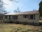 Looking for 1 level living as a starter or down-sizer? This 3 Bedroom, 2 Bathroom Ranch in Town of Plattekill might be what you are looking for. Situated on 1.02 acres, this sprawling ranch offers a bright open living room with cathedral ceilings, huge kitchen, & primary bedroom with full bath & walk in closet. Kick back & entertain or BBQ on your rear deck over looking your level rear yard. Close to hiking, biking, New Paltz, Walk Way Over The Hudson, Mid Hudson Bridge, I-87 shopping, schools and amenities.