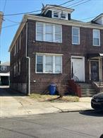Legal 4 family, brick house off Broadway in Woodside. Walking distance to #7 train, subway and LIRR. 3 studios plus a 2 Bedroom apartment. 2 car garage. Total income $7215 per month including $325 for the garage