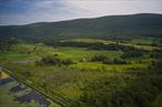 Boston Corners Farm. Estate parcel with incomparably beautiful panoramic views of the Upper Harlem Valley. Conveniently located near the trend setting Hamlet of Millerton NY. Views are almost entirely protected by federal, state and Columbia Land Conservancy properties that make up the Berkshire Taconic Mountain Range and the Harlem Valley Rail Trail Corridor. Walk, bike or drive to Bash Bish Falls, Catamount Ski Area, Hudson, Great Barrington and all the outdoor recreational, artistic, and cultural amenities that make the greater Hudson Valley region one of the most strategically sound and enjoyable place to live in the Western Hemisphere. Rarely does an opportunity such as this present itself. Engineering feasibility study confirms that up to a 5BR single family home can be constructed.
