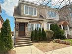 Spectacular, updated single-family home in the heart of Flushing! The first floor features a bright living room, an updated kitchen with quartz countertops, an eat-in island, a dining area, and a renovated bathroom. The second floor offers three spacious bedrooms and a beautifully updated full bath. A finished attic provides additional living space, currently used as a bedroom. Hardwood floors and recessed lighting run throughout the home. Enjoy a spacious backyard perfect for relaxation and entertaining. New Andersen windows. Conveniently located near downtown Flushing, the LIRR, Northern Blvd business district, schools, shops, parks, and multiple transportation options. A fantastic opportunity for homeowners or investors!