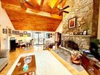 BEAUTIFUL RANCH IN NARROWSBURG NY - Welcome to this meticulously kept home tucked away on a quiet road set on 2.28 acres. Home features a thoughtful layout with a first floor bedroom/full bath, a bonus space that could be a cozy reading nook or a great office. Kitchen and dining area is large with lots of cabinets and new stainless steel appliances. The gem of the house is the living room with vaulted ceilings, large windows/skylights that makes the room bright, beautiful and sunny but the star of the room is the stunning stone wood burning fireplace for the most amazing evenings around the fire. Off of the living room are sliding glass doors that go out onto a large covered deck for the best outside dining or just simply relaxing in this quiet and peaceful setting. Also huge bonus off of the living room is access to the very spacious two car garage featuring a workbench and high ceilings for additional storage. Basement is finished. The yard is large, cleared and lined with trees for privacy and can be so much more, has the potential for gardens, a possible pool or a burning pit to enhance your outdoor living space for everyone to enjoy. Approximately 2+ hrs from NYC,  30 minutes to trains makes this special home a very easy commute. Close by you&rsquo;ll find many quaint towns for dining/shopping, the Delaware River for rafting/fishing, Bethel Woods Preforming Arts Center, Kartrite Indoor Water Park, Resorts World Casino, skiing at Holiday Mountain/Big Bear at Masthope Mountain, many amazing hiking/biking trails and absolutely the best farmers markets you&rsquo;ll find anywhere, all for a very beautiful life in the country.