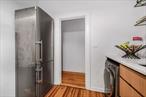 Welcome to this well-maintained 2-bedroom, 1-bathroom apartment in the heart of Jackson Heights! Spanning 1, 100 square feet, this bright and airy home is designed for comfort and convenience. Step inside to find wood floors throughout and a spacious living and dining area perfect for entertaining. The updated kitchen boasts modern appliances, ample cabinet space, and the ultimate luxuryâ€”an in-unit washer and dryer.Both bedrooms offer generous space and natural light, while the apartment is equipped with air conditioning to keep you comfortable year-round. Situated in the Garden Heights Building, this unit provides easy access to public transportation, Q32 and Q33 on the block, shopping, and top-rated restaurants. As an added bonus, residents have exclusive use of private storage and backyard space within the building.