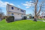 Beautifully Remodeled Expanded Ranch, Features Open Floor plan with Spacious Living Room and Gourmet Kitchen, 5 Bedrooms, 2 Newly Remodeled Full Bathrooms. All new Electrical, Roof, Windows and Siding, New High Efficiency Combo Gas Boiler and New Driveway. Located in South Freeport Near the Famous Nautical Mile, Area shopping, Beaches, Parkways and LIRR. Low Flood Insurance!