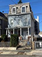 Charming semi-detached two-family home in the heart of Mt. Vernon. The first unit features a spacious 2-bedroom duplex with 1.5 baths, a living room, a dining room, and a kitchen. The second unit offers a cozy 1-bedroom, 1-bath layout with a living room and kitchen. A full basement provides additional space, and the spacious backyard is perfect for outdoor enjoyment. No garage or driveway, street parking only. Selling as-is, presenting a great opportunity for investment or customization. Conveniently located near shops, dining, and transportation. Short sale - subject to bank approval. CASH BUYERS ONLY!