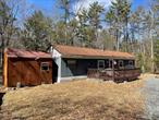 Bring your imagination & tool belt to make this classic mobile home on approximately 2/3 acre in Mohican Lake Community your own! Two bedroom, one bath home is nestled on a wooded lot and has a sense of privacy. Enjoy the outdoors on the front deck.  Newer well & septic. Two outdoor sheds and a camping trailer offer ample storage. Wood burning stove will keep you cozy in the colder months. House is connected to a generator, which will be included with the sale of the property.  Enjoy swimming, kayaking, & fishing on Mohican Lake by joining the community association for access to Mohican Lake; annual fee is nominal and is joining is optional.  Close to the Delaware River for recreation, Bethel Woods & Forestburgh Playhouse, Resorts World Casino & Kartrite Water Park.  A short drive from Port Jervis and Monticello for shopping & public transportation to NYC.  Don&rsquo;t miss your opportunity to enjoy lake life in the Sullivan Catskills!