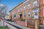 Charming Two-Family Brick Townhouse in Prime Ridgewood LocationLooking for a stunning two-family townhouse in an unbeatable location? Look no further! This beautiful brick home at 64-07 68th Ave, Ridgewood, NY 11385, offers a perfect blend of style, comfort, and convenience.Step inside to find hardwood floors throughout, adding warmth and sophistication to the space. The entryway is beautifully maintained, showcasing original details that add to the homeâ€™s classic charm. Plus, with its south-facing orientation, the house gets abundant natural light all day long.First Floor & BasementThe first floor features a renovated two-bedroom, one-bathroom apartment with access to the basement. The basement, currently used by the owner, is a spacious and functional area with 10-foot ceilings, a home gym, and a partitioned room in the rear with a full bathroom that includes a stand-up shower. It can be accessed from the hallway by either unit.Step outside to your private backyard oasis, complete with well-maintained pavers, a large pine tree for shade, and a deck with a patio setâ€”perfect for relaxing or entertaining.Second FloorUpstairs, you&rsquo;ll find a bright and spacious three-bedroom apartment that has been meticulously maintained. A private deck at the back of the house provides the perfect spot to unwind.Outdoor Living & Prime LocationThe front porch is another great place to relax, offering a welcoming space to sit and enjoy the neighborhood.Located just two blocks from the M train at Fresh Pond Road, commuting is a breeze. Plus, youâ€™re close to all the fantastic amenities Ridgewood has to offer.Donâ€™t miss out on this incredible opportunity!