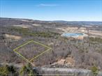 Explore the possibilities with this 5-acre parcel of vacant land, offering a blank canvas for your vision. Nestled in a serene setting, the property features potential scenic views with clearing, a small pond and meandering streams. The land is wooded, providing privacy and a sense of seclusion.Located just minutes from Windham Mountain, Zoom Flume, Durham and Cairo. You will also enjoy easy access to local farms, restaurants, hiking trails, and a host of activities throughout the year. This property offers an ideal location for a full-time residence or a tranquil weekend retreat. Embrace the opportunity to create your dream sanctuary in this sought-after area.