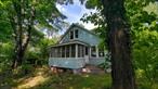 Back on the market and at a new price too! Don&rsquo;t miss out this time around. Ready to Make This Cute Cape Cuter? This house has a solid start with recent upgrades, like a newer roof and double-hung thermal pane windows. Plus, this quiet charmer comes with a wood burning fireplace, enclosed porch and 3 nice sized bedrooms with one and a half baths. The fenced-in yard comes with gorgeous perennial plantings now in full bloom. You might have missed prime planting season this year, but you&rsquo;ll have fun planning your garden for next year. Conveniently located near schools, shopping, dining, parks, and more. This is it. Time to make it home!