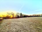 Discover the perfect opportunity to own over 14 acres on picturesque Sunrise Hill, where you can build your dream home. This stunning property features a sprawling open field with breathtaking views, seamlessly transitioning into a serene wooded area. Nestled on a peaceful country road, it offers the ideal blend of privacy and convenience - just a short drive from Walton, the recreational haven of East Sidney Lake, the charming historic arts village of Franklin, and the shopping and entertainment of Oneonta. Don&rsquo;t miss this chance to create your own retreat in the heart of nature!