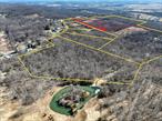 Conditionally approved subdivision for sale with 13 estate type lots. The largest parcel 67+ acres has utilities abutting and a rough road cut in to access the property. This parcel is well balanced with a short road to access all 8 future lots. Property is being sold with all approvals in place but no improvements to this site. Included with the sale is 5 additional road frontage approved building lot&rsquo;s as follows 11.3 Acres - ideal for horses. 5.2 Acres - mostly wooded. 5.0 Acres - slightly sloping and wooded, . 6.7 Acres - large road frontage and a 16.7 Acres - flag lot private set back on a wooded parcel. The owner is looking for a package deal for all 13 approved lots and will be delivering the property with all approvals in place. Perfect site for developer to start off the road frontage and and work their way into the subdivision with the proposed private road. Site plan, soils and wetland maps under documents call listing agent for more details.