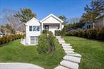 Located in just down the road from Little Fresh Pond Road you will find this meticulously gut-renovated home that has everything you need to relax and enjoy. Designed with quality and comfort in mind, this home features a custom eat-in-kitchen with top of the line appliances, large pantry, 3 en-suite bedrooms, office/gym area, laundry and a garage. The cathedral ceiling living room has a wet bar with a wine refrigerator, guest bathroom and opens up to a large covered brick patio perfect for entertaining. Surrounded by newly planted evergreen trees, you will find a heated gunite pool, large lawn with irrigation system and a beautiful front entrance with gravel driveway and plenty of parking. Minutes to Southampton Village ocean beaches, restaurants and shopping.