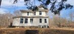 Stunning 1.8 acres, the land is connected to municipal water and sewer services, and it has zoning that allows for the construction of at least two additional homes or more, pending necessary approvals.Existing Victorian Home: A characterful Victorian-style residence, featuring 3 bedrooms and 2 full baths. 2 extra rooms on the first floor, providing flexible usage options. A laundry room. A new heating system powered by efficient mini-split units. Land Features includes the grounds are a visual treat, featuring open, level spaces with mature trees a charming mix of woods and historic stone walls.Nestled in the Fallsburg area,  it offers proximity to amenities, side to side with Fallsburg Hills Estates.This property seems like a unique opportunity for both personal enjoyment and development.