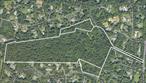 Brookville  On the market for the first time in over a century, welcome to 2340 Cedar Swamp Road - a once-in-a-lifetime opportunity to own an estate in the heart of Long Island&rsquo;s Gold Coast. This property, totaling a near 52-acres of undeveloped land, was once home to the Joan of Arc Chapel - a small chapel imported by Gertrude Hill Gavin, daughter of railway director, James Jerome Hill. It was one of the last French relics to be imported into the United States before France enacted a ban on the export of such treasures, and was donated by a previous owner of the estate to Marquette University. After being overcome by a blazing fire in 1964, that burned for over 16 hours, all that currently stands is the remnants of a guest house, stables, and servant quarters. Being sold as-is, this property is a total of 3 lots, and has the potential to be subdivided, with 3-acre zoning. The possibilities are endless - envision a future of a modern, gated community with luxury homes, or bring this beautiful estate back to life, and live lavishly on a secluded property surrounded by history.