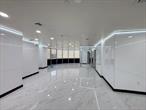 This newly renovated, move-in ready office space offers 1, 806 SF (approx.) of modern and professional workspace. Designed to accommodate any type of professional or medical office, this space features high-end finishes and a flexible layout, making it ideal for businesses looking to establish or expand in a prime location. Situated in a prime Flushing commercial hub, this office is close to multiple bus lines, the 7-subway train at Roosevelt Avenue, and the LIRR, the busiest station outside of Manhattan. The property is also just two blocks from Main Street, Flushing Commons, and Queens Crossing, surrounded by a vibrant mix of restaurants, retail shops, and business establishments. Adding to its convenience, a two-level parking garage is available for lease, providing secure and ample parking for tenants and visitors.