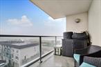 Welcome to this gorgeous 5th-floor condo where stunning ocean views meet incredible value. From your private balcony, take in endless beach views that feel like a dream. Head up to the rooftop and experience a breathtaking panorama of the Atlantic Ocean and the New York City skylineâ€”perfect for morning coffee or sunset lounging. This beachside gem includes parking and bike storage for your convenience. Just steps away, enjoy the iconic Rockaway boardwalk that comes to life on beautiful warm sunny days. With the city just a quick train ride away, you get the best of both worlds. Live the coastal lifestyle youâ€™ve always wantedâ€”schedule your tour and fall in love today.