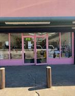 Attached store in a shopping center with parking in both front and rear of the building. Located in the center of Central Islip.
