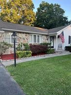 Enjoy seasonal views of the Hudson River from this sprawling 3 bedroom, 3.5 bathroom stone and vinyl ranch with over 2, 500 sq. feet of bright and inviting living space. The large (newly updated) finished walk-out basement provides great accessory apartment potential! The first floor has everything you need if you are looking for single-level living! The over-sized living-room offers New Mannington Hillside Hickory Cloud Floors, custom lighting, and crown molding. As you enter the recently renovated kitchen you are welcomed with 83 Sq Footage of Calacata Bello Quartz Countertop including backsplash and a large island. New LG Appliances - Fridge, Air-Fryer Oven, Dishwasher, and Microwave. New Natural Gas Furnace including hookup for natural gas dryer, and hookup for natural gas grill, hot tub or fireplace on the deck. Finish all of this off with Mountain & River Views from the new Trex deck, sunroom, and two bedrooms including historic Bannerman island. You will find this location to be both convenient and inviting! Perfectly located 3 miles from train station, .3 miles from the bus stop and 45 minute drive to NYC! As an added bonus you can enjoy the attached garage, fully fenced in yard, and wonderful views from the deck!