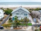 Oceanfront 4 bedroom, 4 bathroom Beach House with Dual Kitchens & Expansive Views just Steps to the Sand! Experience the ultimate beachfront lifestyle in this oceanfront home with horizon views. Perfectly positioned just minutes from town and minutes to the ferry, this exceptional property offers dual kitchens with butcher block and carrara marble countertops, two balconies, and expansive decking, providing the perfect blend of comfort, convenience, and breathtaking scenery.  Sunrise, Sunsets, NSEW exposure and Plenty of space for family and guests.  There areTwo Dual Wood-Burning Fireplaces to Cozy up on cool nights with authentic warmth and charm, Modern Heating & cooling plus on-demand hot water heater and central air (as is). Bonus Storage Space includes a rentable coral. Located in Cherry Grove, Fire Island this rare offering combines the best of beachfront living with convenient access to town and ferry. Whether you&rsquo;re looking for a vacation retreat or an investment property, this home delivers it all.