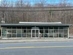THREE Commercial Buildings with one of them containing a one-bedroom Residential unit. 200&rsquo; of road frontage. PUBLIC SEWER. Great investment opportunity or End User property. Strategically located along the up-and-coming Route 52 corridor, this property benefits from excellent road exposure and is poised to capitalize on the area&rsquo;s ongoing developments.  Convenient location on Route 52 with substantial daily traffic counts, easy access to I-84, and nearby town centers.