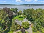 MODERN, TURN-KEY LUXURY LIVING ON THE HUDSON & STEPS TO ALL! This Hudson River stunner is truly a unicorn. Imagine starting your day with breathtaking, unobstructed panoramic views and ending the day with dazzling Hudson sunsets. This rare modern masterpiece sits on 1.2 acres of expansive, park-like level grounds, in the heart of the village of Irvington, steps from the Ardsley-on-Hudson Train Station (under 40 minutes into Grand Central along the Hudson), 5-Star Restaurants, the Farmers&rsquo; Market, Matthiessen Park, the Old Croton Aqueduct, all four Irvington schools, three coffee shops, and more. 30 Half Moon was thoughtfully redesigned with a seamless blend of sophistication and tranquility. Featuring walls of glass that blur the lines between indoors and out, this home immerses you in natureâ€™s beauty from every angle. This 6 bedroom, 5.5 bath, 5, 243 sf home offers effortless living with its sun-drenched open-concept layout, soaring ceilings, multiple skylights, and expansive outdoor entertainment spaces. Custom finishes include-triple-pane windows and doorsâ€”soundproof, energy-efficient, and designed to enhance natural light, 5â€ maple flooring with radiant heat throughout the entire home, smart home technologyâ€”climate control, motorized shades, multi-zone heating & cooling, remote-controlled skylight shades, 19 irrigation zones, a new high-efficiency boiler, and whole house generator. Entertaining is a dream inside and out. The kitchen is a culinary enthusiast&rsquo;s delight, designed for both function and flair featuring-chunky quartzite countertops and custom millwork, top-of-the-line appliances: Sub-Zero refrigerator, two Thermador ovens, a warming draw, 6-burner stove, wine fridge and two dishwashers. Take the party outdoors with seamless indoor-outdoor flow for effortless entertaining to a sprawling Ipe deck with custom railing system, a sunken gas fire-pit surrounded by bluestone, and a fully equipped outdoor kitchen featuring a DCS gas grill, hood exhaust, heaters, fans, and integrated speakers. The backyard is an absolute paradise, fully deer fenced for your furry friends&rsquo; enjoyment, featuring a playground and raised bed garden for those gardening enthusiasts! In addition to the kitchen, living room, family room, flex room (currently used as a homework room), mudroom, and 2-car garage: the main living space also offers two separate bedroom wings; one set of two bedrooms with ensuite bathrooms (one that is wheelchair accessible) perfect for in-laws, au pairs, nannies or as office space. The other wing provides two additional bedrooms and a hall bath. The lavish primary sanctuary on the second floor is a showstopper with direct Hudson River views and a private balcony to enjoy your coffee or a glass of wine gazing at the sunsets. Additional features include-a gas fireplace with custom stone cladding and mahogany accents, two custom walk-in closets, and a spa-like ensuite bath with soaking tub and oversized shower. There is also a versatile second bedroom/office/nursery with ensuite bath on the second floor. This high-tech modern oasis offers an unparalleled lifestyle on the Hudson in the heart of the Rivertowns. Watch bald eagles soar over the Hudson, and Piermont disappear in mist. This is a rare opportunity to own a breathtaking waterfront retreatâ€”schedule your private tour today!