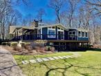 Welcome to this high-quality beach home to stay for a couple of weeks in the summer or for a few months in the offseason.  This custom designed impeccable home contains four bedrooms and four full bathrooms. There is an open floor plan with vaulted ceilings, from the chef&rsquo;s kitchen to the dining and living room. Enjoy a barbecue in the enclosed porch. Beautiful tranquil setting with views of the water and a community beach up the street. Available for two week stays in July and August for $10, 000 or $10, 000 per month April, May, June, September, October, November, December. Southold Town Rental Permit #0971