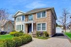 Discover this stunning 5-bedroom, 4-bath custom home in the heart of Roslyn Heights, built in 2016. A soaring double-height foyer welcomes you into an elegant layout featuring a formal living room, home office, and a spacious formal dining room. The gourmet kitchen boasts natural marble countertops, radiant heated floors, and flows seamlessly into the sunlit family room. One full bath is conveniently located on the main floor.Upstairs, the oversized primary suite features vaulted ceilings, a spa-like bath with soaking tub, glass-enclosed shower, and heated towel rack. An additional en-suite bedroom plus two more bedrooms sharing a full bath provide space for all. The beautifully landscaped backyard offers year-round beautyâ€”perfect for relaxing or entertaining.This exceptional home blends timeless design, luxurious features, and a prime location in one remarkable package.