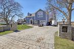 Welcome to a piece of Paradise! this beautiful 1928 5, 700 sq. ft. Georgian Colonial, features 7 large bedrooms, 3.5 baths, 16 rooms total, located on beautiful Sampums deep water creek, a few hundred yards from the Great South Bay. this lavish estate offers, poly/glass siding with a 50yr warranty, new central air, decks and terrace built with azek decking. All new exterior lighting, completely reconstructed 10feet deep heated saltwater inground pool, 5 boat slips and guest cottage. Here is your opportunity to own a piece of paradise, a once in a lifetime chance!!
