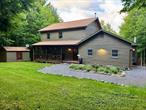 This stunning, turnkey Windham mountain cabin is the perfect spot to enjoy year round for yourself or as a short-term rental. And it&rsquo;s being sold fully furnished -- just bring your toothbrush! Situated on 5.5 acres, this beautiful home is minutes from skiing, hiking, golf, restaurants, spas and shops! Following a full renovation and meticulous redesign by the owner - an interior designer - the home blends traditional mountain charm with modern amenities creating a warm, cozy, and spacious atmosphere. Featuring new appliances, flooring, bathrooms, countertops, doors and more, the interior offers multiple spaces to relax and enjoy the tranquility of the mountain lifestyle. The main floor features an oversized mudroom (with new washer/dryer), powder room, spacious living room with a wood-burning fireplace, lovely kitchen with breakfast bar and dining area, bedroom/family room, and a full bathroom. On the second floor you&rsquo;ll find three additional bedrooms and two full bathrooms. The finished lower level is the perfect hang out spot - equipped with ping pong, a pool table and walk-out access to the backyard. A large deck spans the length of the house, offering plenty of room for dining and lounging while the stone fire pit is ideal for roasting sâ€™mores under the stars. The property is directly adjacent to the Vineyard at Windham, where you can enjoy weekend wine tastings and charcuterie in a picturesque setting.This house is move-in ready for those seeking a year-round getaway. The property also offers huge rental income potential as a short-term or seasonal rental as it is just down the road to the Windham Manor, which hosts weddings year-round as well as The Vineyard, a hot spot for bachelorette parties and other events. Itâ€™s also located minutes from the ski mountain as well as various other attractions.